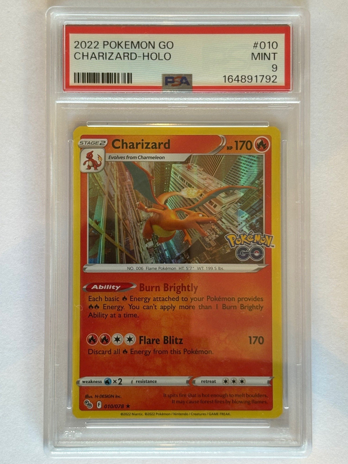 Charizard 010/078 PGO EN HOLO PSA 9